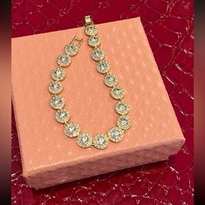 - 14kt gold plated tennis bracelet with Swarovski elements - not swan stam…